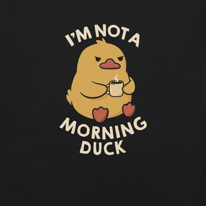 A cute little yellow duck, with a grumpy face, holding a mug of coffee and surrounded by the words "I'm Not a Morning Duck". This design plays on the humor of difficult mornings, mixing cuteness and sarcasm for those who only function after coffee. Perfect for those who are not at all morning people, coffee lovers and fans of funny prints and cute ducks.