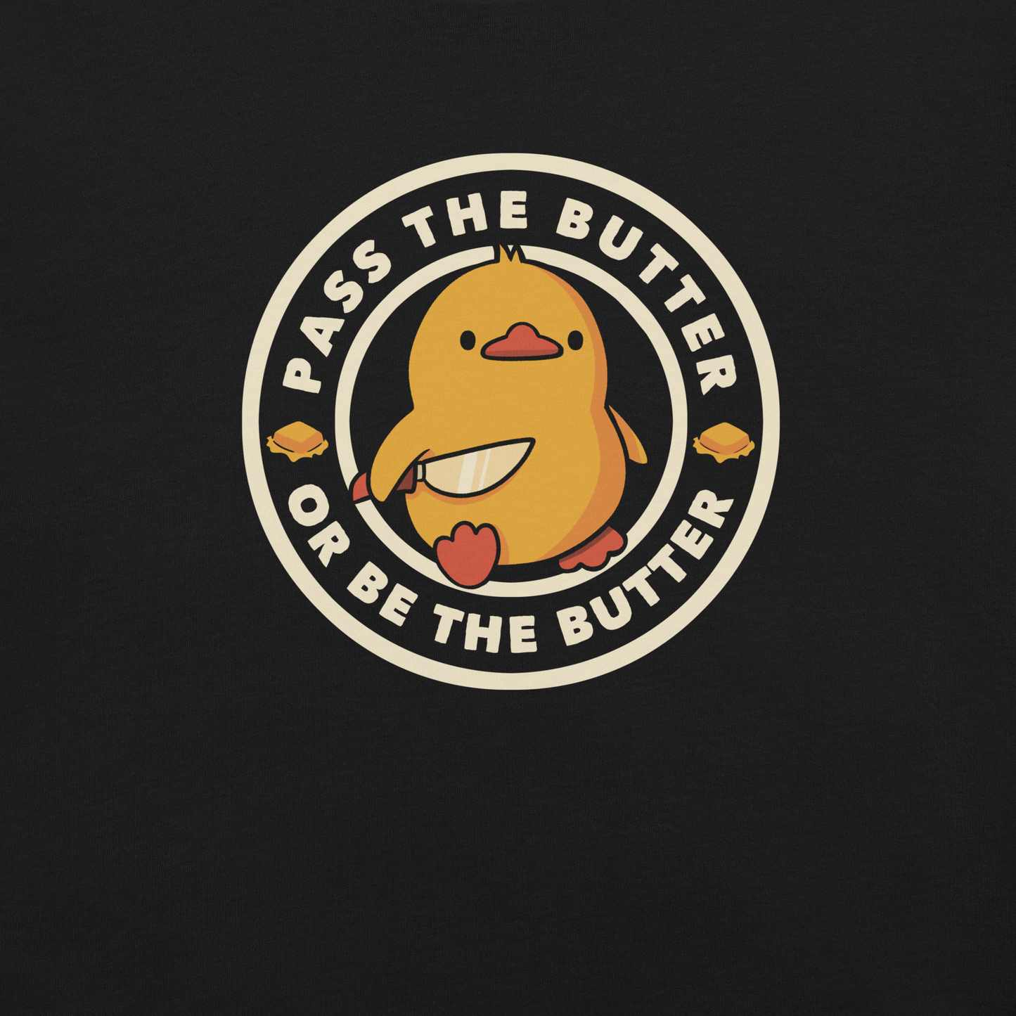 A yellow duckling holding a butter knife in a cute pose, around him the phrase "Pass the butter or be the butter". An art with a lot of humor for those who love ducks.