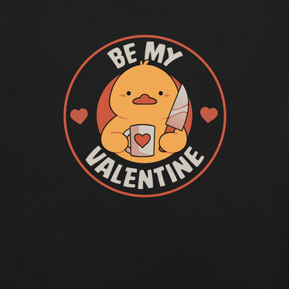 A cute duckling holding a heart-shaped coffee mug and a small knife, paired with the phrase ‘Be My Valentine Funny Duck’. A playful mix of cuteness and dark humor, perfect for coffee lovers and fans of ironic, quirky art.