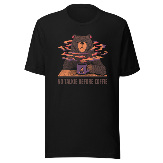 A large brown bear holding a purple coffee cup with a campfire design, with steam rising as if the coffee were piping hot. Below it appears the phrase ‘No Talkie Before Coffie’. A fun design for coffee lovers and anyone who isn’t ready to talk before their first cup.