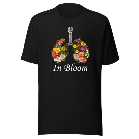 Two lungs transforming as if they were blooming flowers, accompanied by the phrase ‘In Bloom’. A calm, poetic design that evokes growth, breathing, and a gentle connection with nature.