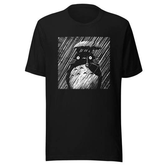 A large forest spirit stands still in the rain, holding a tiny umbrella while soaking in the storm. This black and white design captures a quiet, emotional moment with a vintage, textured style.