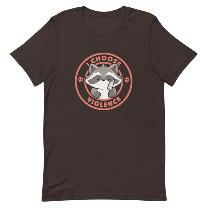 A cute cartoon raccoon character stands with a small knife, surrounded by a red circular border with the text 'I CHOOSE VIOLENCE'. The raccoon looks adorable yet mischievous, with a playful expression. Two small skulls are on either side of the circle, adding humor to the bold statement.