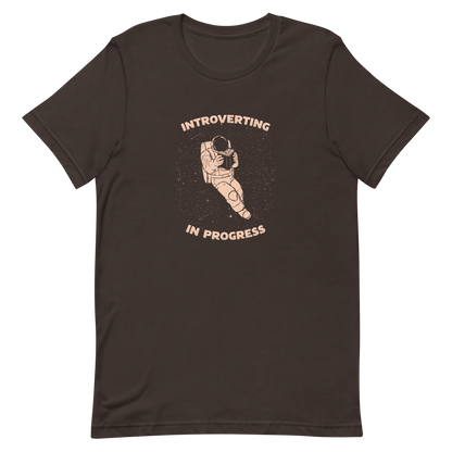 An astronaut floats in space while reading a book, surrounded by twinkling stars. The artwork represents the beauty of introspection and a quiet retreat amidst the universe. Perfect for introverts, passionate readers and dreamers who love the combination of space and tranquility.