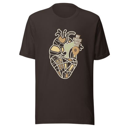 An anatomical heart illustrated like a map, marked with a small coffee-bean pin beside the phrase “My Coffee Lives Here”. A symbolic and cozy design that blends warmth and creativity, perfect for coffee lovers who treat their favorite brew as the fuel that keeps their heart beating.