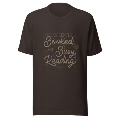 A warm hand-lettered typography featuring the phrase ‘Currently Booked and Busy Reading’, accented with delicate book illustrations and subtle sparkles on a dark background. A cozy, elegant design that celebrates the joy of reading, perfect for book lovers, students, introverts, and anyone who would rather be reading.