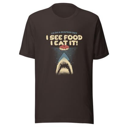 A shark rising from the water toward a floating donut, paired with playful retro typography. The artwork uses visual humor and a classic joke to create a fun, eye-catching composition with strong graphic contrast. Perfect for humor lovers, food fans, and anyone who enjoys witty designs with a slightly cheeky twist.