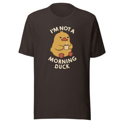 A cute little yellow duck, with a grumpy face, holding a mug of coffee and surrounded by the words "I'm Not a Morning Duck". This design plays on the humor of difficult mornings, mixing cuteness and sarcasm for those who only function after coffee. Perfect for those who are not at all morning people, coffee lovers and fans of funny prints and cute ducks.