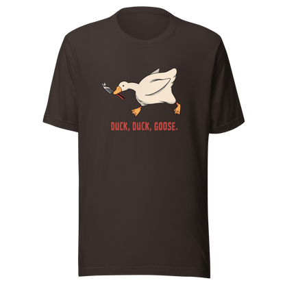 A white goose gripping a sharp knife in its beak with the phrase “Duck, Duck, Goose” below. A playful twist on the classic game, this design captures chaotic goose energy with a sharp dose of dark humor.
