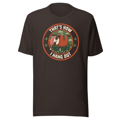 A cute illustration of a sloth wearing a cap, hanging lazily from a branch with the phrase 'That's How I Hang Out'. A fun and relaxed design, perfect for sloth lovers and anyone who enjoys taking life a little slower.