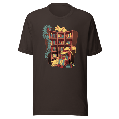 A cozy fantasy library depicts a mysterious reader in a wide-brimmed hat, surrounded by books, the light of a lamp, hanging plants, and small bird-like creatures. The illustration conveys tranquil reading, comfort, and magical escapism.