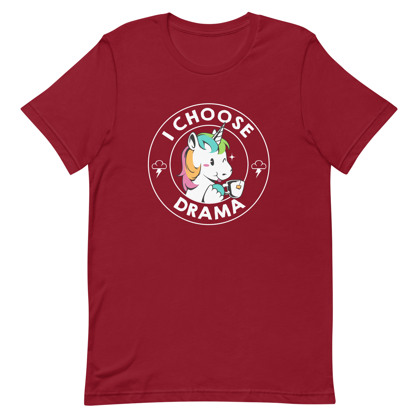 A cartoon unicorn with rainbow-colored mane holds a cup of tea and a heart, encircled by the words 'I Choose Drama'. Two small clouds with lightning bolts flank the unicorn, adding a playful yet slightly edgy vibe. The design is bold and whimsical with a pop-art influence.