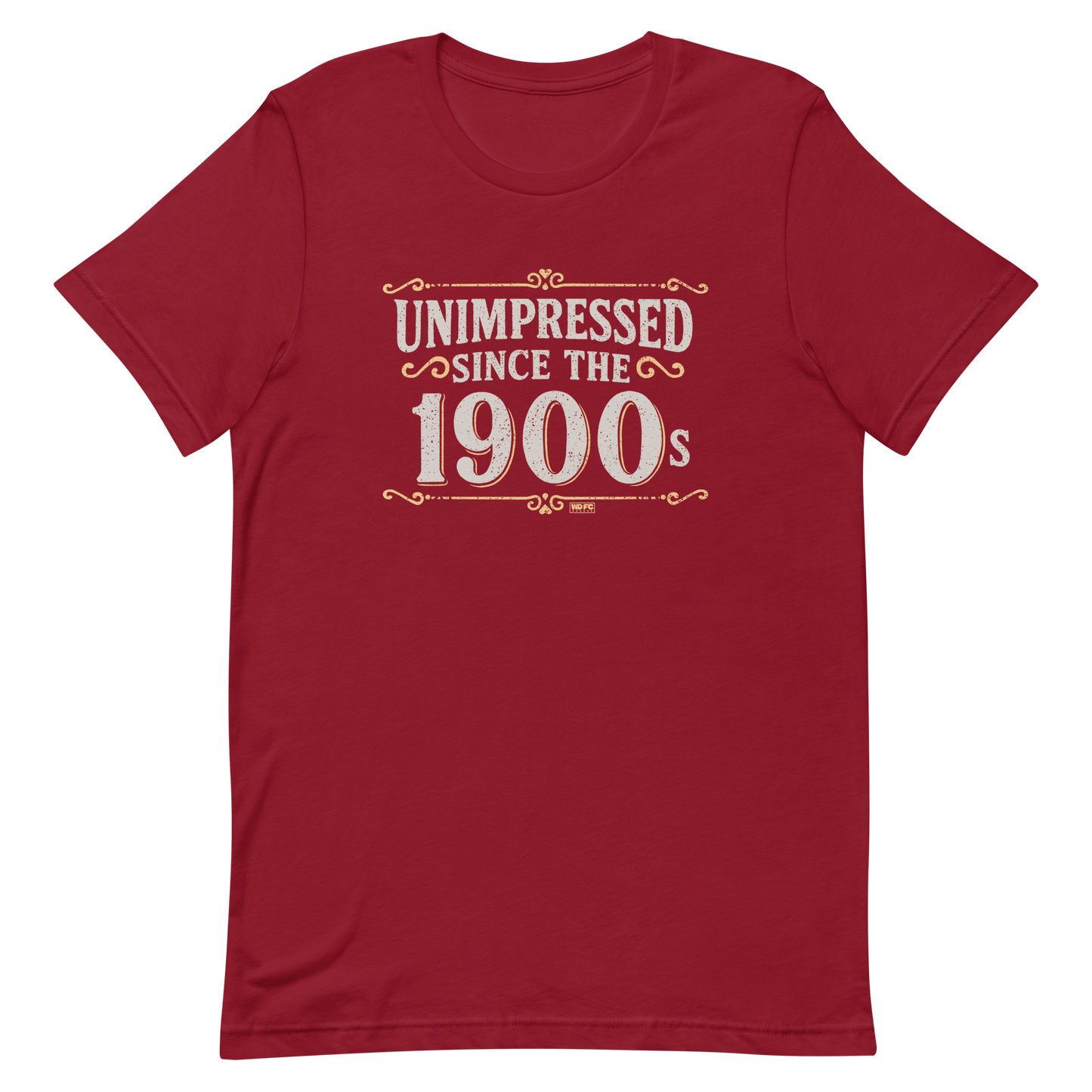 Vintage-style graphic with the phrase “Unimpressed Since the 1900s” in bold distressed lettering, decorated with ornate flourishes and a retro color palette.
