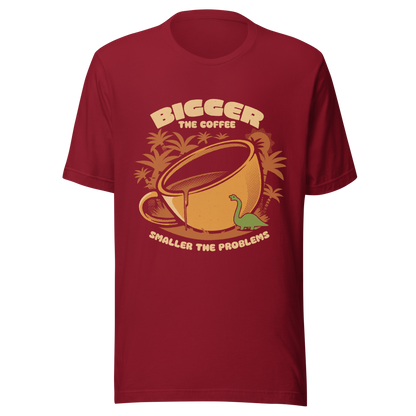 A giant retro-style coffee cup, with a little dinosaur strolling around and palm trees in the background. This design plays on the phrase "Bigger the coffee, smaller the problems," creating a cute and humorous scene about morning survival. Perfect for coffee lovers, dinosaur fans, and those who enjoy fun art.