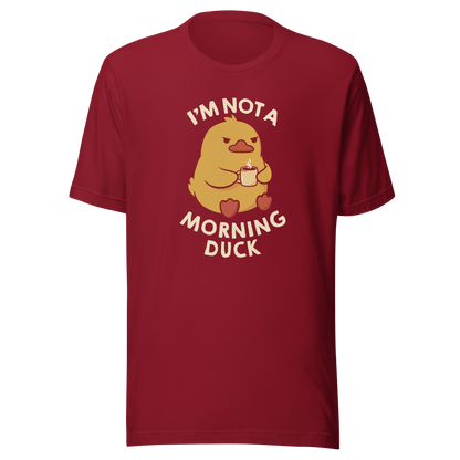A cute little yellow duck, with a grumpy face, holding a mug of coffee and surrounded by the words "I'm Not a Morning Duck". This design plays on the humor of difficult mornings, mixing cuteness and sarcasm for those who only function after coffee. Perfect for those who are not at all morning people, coffee lovers and fans of funny prints and cute ducks.