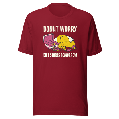 A playful design featuring a sleepy yellow cartoon character next to an open box of donuts, surrounded by crumbs and icing, with the phrase “Donut Worry Diet Starts Tomorrow”. Sweet, relatable and full of humor, it’s the perfect gift for donut lovers and anyone who believes diets can always start tomorrow.