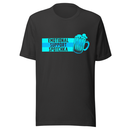 The design features a stylized mug filled with a frothy beverage, colored in vibrant shades of blue. Next to the mug, bold text reads 'EMOTIONAL SUPPORT SPOTCHKA'. The use of color and font style gives it a playful, pop-culture vibe, hinting at something fantastical or sci-fi influenced.