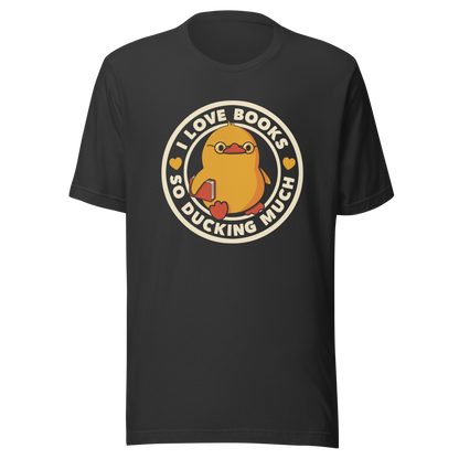 A cute yellow duckling with glasses and holding a book, around it the phrase "II Love Books So Ducking Much". A perfect gift for anyone who loves ducks and books.