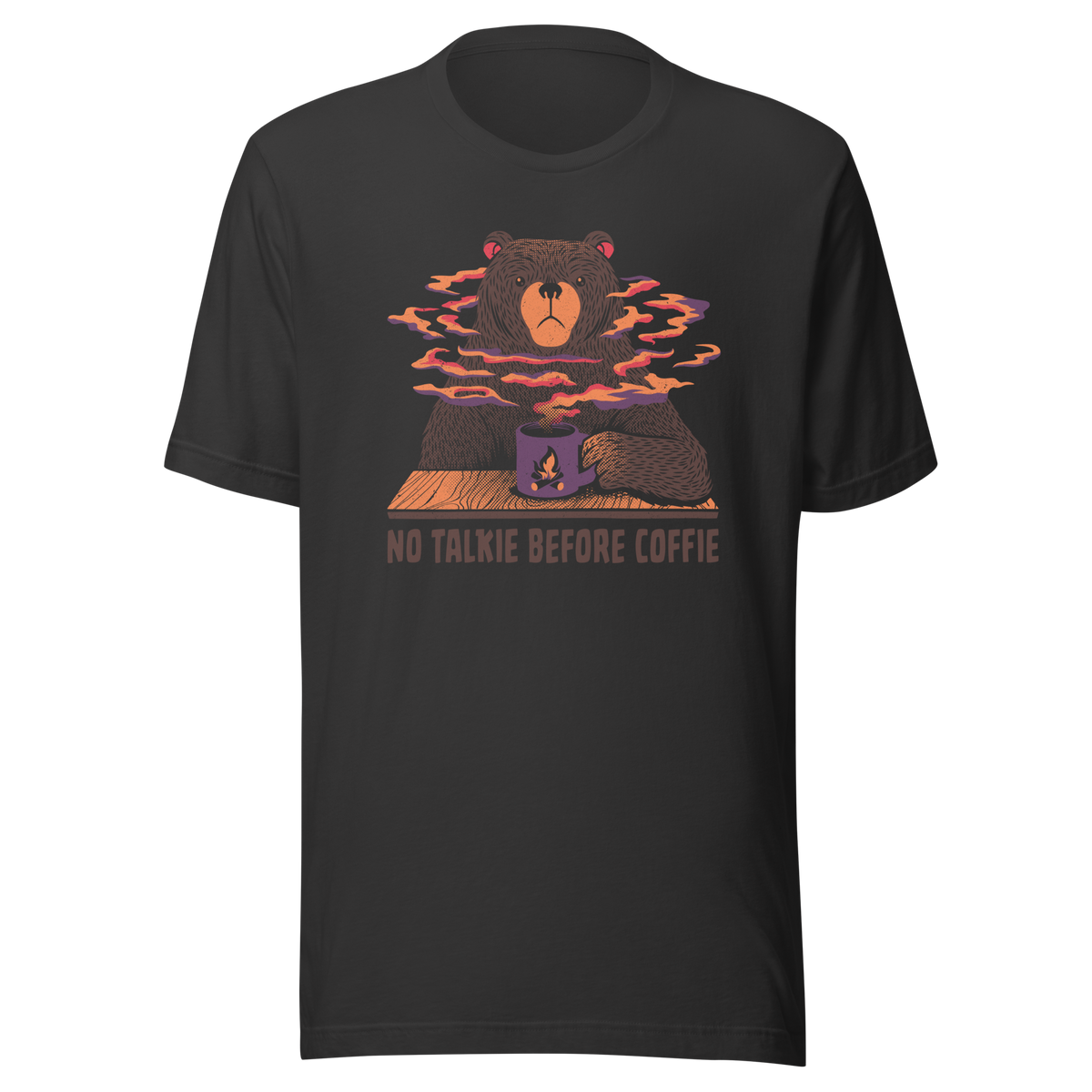 A large brown bear holding a purple coffee cup with a campfire design, with steam rising as if the coffee were piping hot. Below it appears the phrase ‘No Talkie Before Coffie’. A fun design for coffee lovers and anyone who isn’t ready to talk before their first cup.