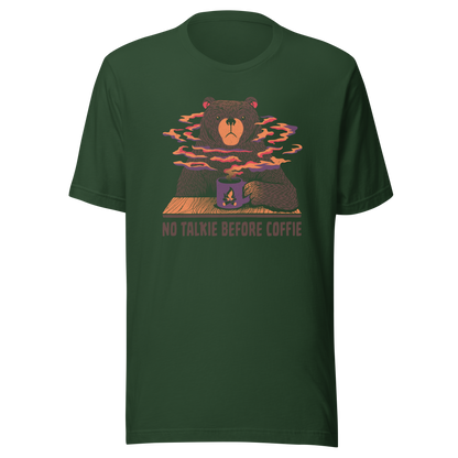 A large brown bear holding a purple coffee cup with a campfire design, with steam rising as if the coffee were piping hot. Below it appears the phrase ‘No Talkie Before Coffie’. A fun design for coffee lovers and anyone who isn’t ready to talk before their first cup.