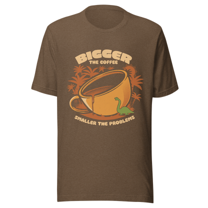 A giant retro-style coffee cup, with a little dinosaur strolling around and palm trees in the background. This design plays on the phrase "Bigger the coffee, smaller the problems," creating a cute and humorous scene about morning survival. Perfect for coffee lovers, dinosaur fans, and those who enjoy fun art.
