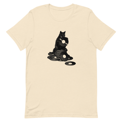 This design features a black cat cozily perched atop a stack of vinyl records, clutching one like it’s pure gold. It’s a tribute to analog lovers, feline charm, and the timeless joy of spinning a record. Perfect for music collectors, cat enthusiasts, and anyone with a nostalgic soul.