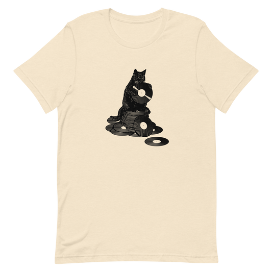 This design features a black cat cozily perched atop a stack of vinyl records, clutching one like it’s pure gold. It’s a tribute to analog lovers, feline charm, and the timeless joy of spinning a record. Perfect for music collectors, cat enthusiasts, and anyone with a nostalgic soul.