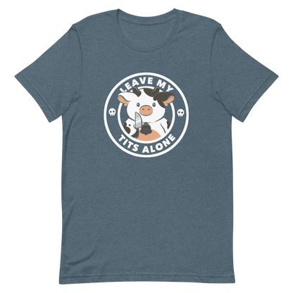 A quirky stamp-style design featuring a cute spotted cow holding a knife with the phrase “Leave My Tits Alone.” It mixes humor, attitude, and a playful call for animal respect. Perfect for cow lovers, fans of sassy humor, and anyone who supports animal rights.