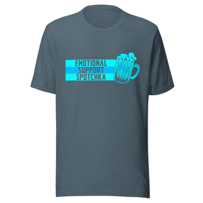 The design features a stylized mug filled with a frothy beverage, colored in vibrant shades of blue. Next to the mug, bold text reads 'EMOTIONAL SUPPORT SPOTCHKA'. The use of color and font style gives it a playful, pop-culture vibe, hinting at something fantastical or sci-fi influenced.