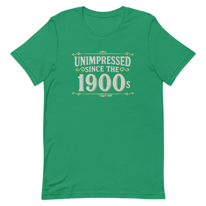 Vintage-style graphic with the phrase “Unimpressed Since the 1900s” in bold distressed lettering, decorated with ornate flourishes and a retro color palette.