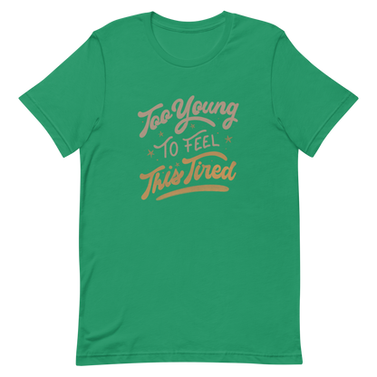 The artwork features the vintage-style lettering "Too Young To Feel This Tired," with touches of beige and gold, decorated with small stars. This playful phrase conveys the feeling of premature fatigue with an ironic and stylish touch. Ideal for young adults, students, and anyone who can relate to the daily struggle between energy and exhaustion.