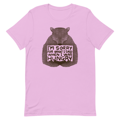 The image shows a humorous, detailed illustration of a bear, drawn in a hand-drawn style, holding a sign that reads 'I'm sorry for what I said when I was hungry.' The bear appears to be apologizing in a comical, endearing manner, making it a relatable and light-hearted design.