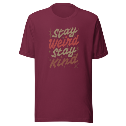 A bold typography design featuring the phrase “Stay Weird Stay Kind” in warm shades of brown and red. A simple yet striking piece that celebrates individuality and kindness with personality and charm.