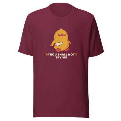 A duck holds a shiny knife with a blank stare and above the phrase “Thou Shall Not Try Me Funny Duck”. This design mixes dark humor and cuteness in the most unexpected way. Perfect for those who love ducks, sarcastic jokes and edgy humor.