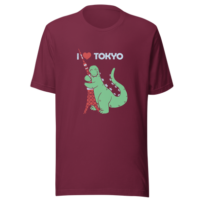 Funny cartoon monster hugging the Tokyo Tower under an “I Love Tokyo” sign. Retro-style parody artwork with vintage textures and playful giant-creature humor.