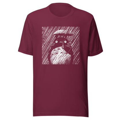 A large forest spirit stands still in the rain, holding a tiny umbrella while soaking in the storm. This black and white design captures a quiet, emotional moment with a vintage, textured style.