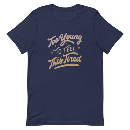 The artwork features the vintage-style lettering "Too Young To Feel This Tired," with touches of beige and gold, decorated with small stars. This playful phrase conveys the feeling of premature fatigue with an ironic and stylish touch. Ideal for young adults, students, and anyone who can relate to the daily struggle between energy and exhaustion.