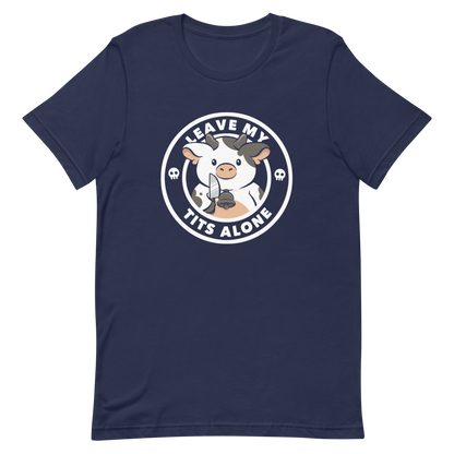 A quirky stamp-style design featuring a cute spotted cow holding a knife with the phrase “Leave My Tits Alone.” It mixes humor, attitude, and a playful call for animal respect. Perfect for cow lovers, fans of sassy humor, and anyone who supports animal rights.