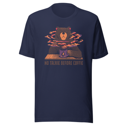 A large brown bear holding a purple coffee cup with a campfire design, with steam rising as if the coffee were piping hot. Below it appears the phrase ‘No Talkie Before Coffie’. A fun design for coffee lovers and anyone who isn’t ready to talk before their first cup.