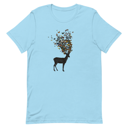 The image depicts a dark, silhouetted deer standing on a neutral background. Instead of branches, its antlers transform into a swirling cloud of vibrant, colorful butterflies that extend upwards and outward. The mix of organic and ethereal elements creates a captivating and whimsical visual contrast.