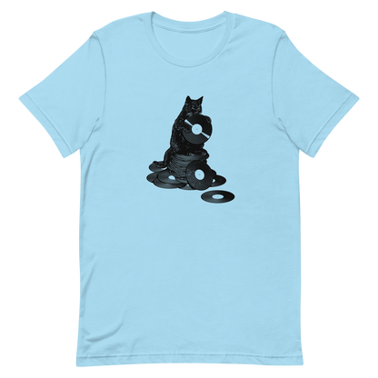 This design features a black cat cozily perched atop a stack of vinyl records, clutching one like it’s pure gold. It’s a tribute to analog lovers, feline charm, and the timeless joy of spinning a record. Perfect for music collectors, cat enthusiasts, and anyone with a nostalgic soul.