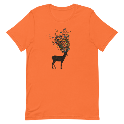 The image depicts a dark, silhouetted deer standing on a neutral background. Instead of branches, its antlers transform into a swirling cloud of vibrant, colorful butterflies that extend upwards and outward. The mix of organic and ethereal elements creates a captivating and whimsical visual contrast.