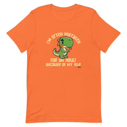 Cute cartoon dinosaur standing with a funny expression, accompanied by the humorous phrase “I’m Often Mistaken for an Adult Because of My Age” in bold distressed lettering.