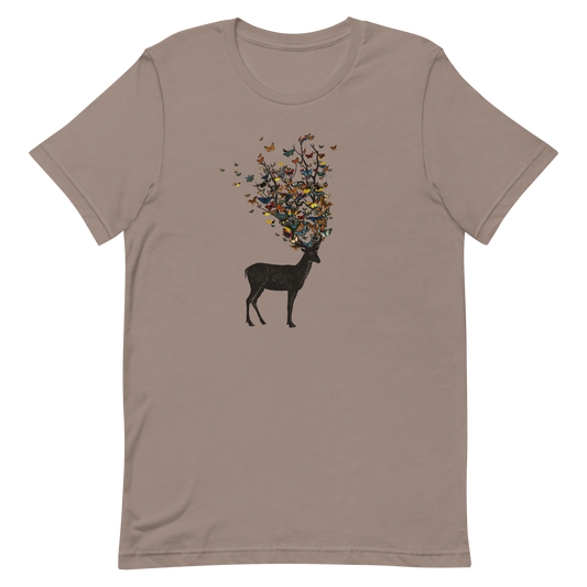 The image depicts a dark, silhouetted deer standing on a neutral background. Instead of branches, its antlers transform into a swirling cloud of vibrant, colorful butterflies that extend upwards and outward. The mix of organic and ethereal elements creates a captivating and whimsical visual contrast.