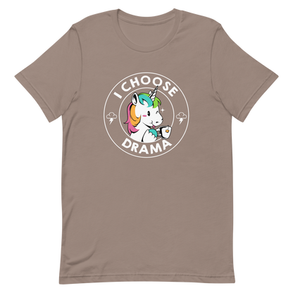 A cartoon unicorn with rainbow-colored mane holds a cup of tea and a heart, encircled by the words 'I Choose Drama'. Two small clouds with lightning bolts flank the unicorn, adding a playful yet slightly edgy vibe. The design is bold and whimsical with a pop-art influence.