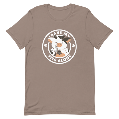 A quirky stamp-style design featuring a cute spotted cow holding a knife with the phrase “Leave My Tits Alone.” It mixes humor, attitude, and a playful call for animal respect. Perfect for cow lovers, fans of sassy humor, and anyone who supports animal rights.
