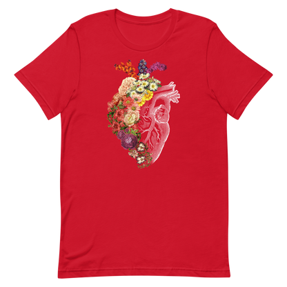 The design is an intricate and anatomical drawing of a human heart on a black background. The left side of the heart morphs into a vibrant assortment of colorful flowers, including roses, daisies, and other blooming blossoms, creating a striking contrast between the realistic and the surreal, symbolizing the harmony between nature and humanity.