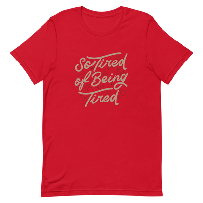 The artwork features the retro-style lettering "So Tired of Being Tired" surrounded by small icons like stars, hearts, clouds, and spider webs. This composition expresses the feeling of constant fatigue in a fun and stylish way. Ideal for those who bring humor to life and those who experience exhaustion in a lighthearted and humorous way.