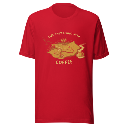 This funny illustration shows a tadpole evolving into a terrestrial creature while reaching for a cup of coffee. Paired with the phrase ‘Life Begins After Coffee Evolution’, the artwork humorously compares human evolution to our daily need for coffee.