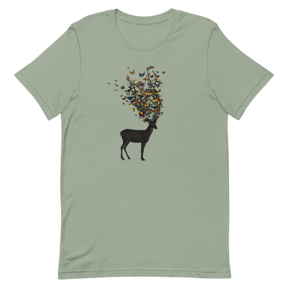 The image depicts a dark, silhouetted deer standing on a neutral background. Instead of branches, its antlers transform into a swirling cloud of vibrant, colorful butterflies that extend upwards and outward. The mix of organic and ethereal elements creates a captivating and whimsical visual contrast.